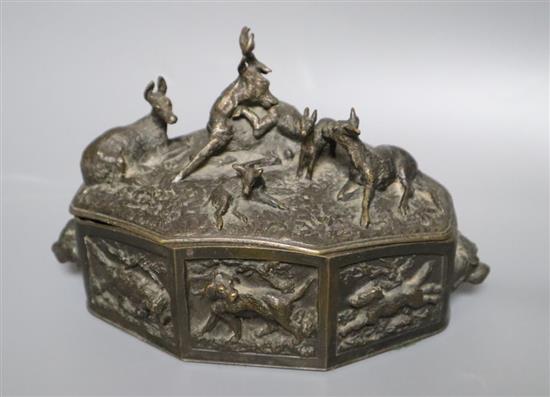 A bronze box with stag and deer surmounted lid, height 11cm
